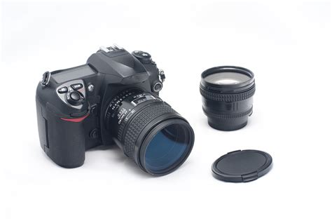 Free Stock Photo 12165 Digital SLR Camera with Lenses and Lens Cap | freeimageslive