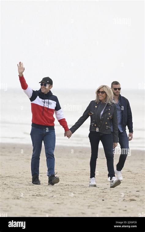 French President Emmanuel Macron and wife Brigitte Macron walking on ...