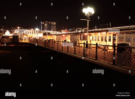 Brighton Pier at night Stock Photo - Alamy