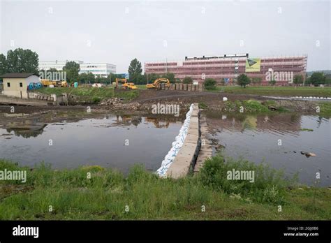 River dam repair construction works Stock Photo - Alamy