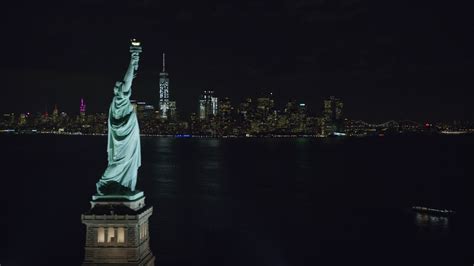 6K stock footage aerial video of Statue of Liberty and Lower Manhattan ...