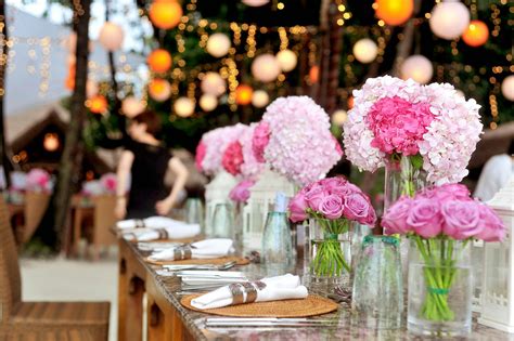 Table With Plates and Flowers Filed Neatly Selective Focus Photography · Free Stock Photo