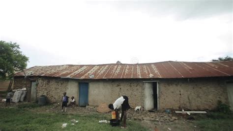 KISUMU,KENYA - MAY 15, 2018: African Family Near Their Home. a Little ...