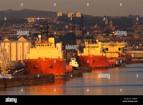 Aberdeen harbour with North Sea oil and gas industry supply vessels in ...