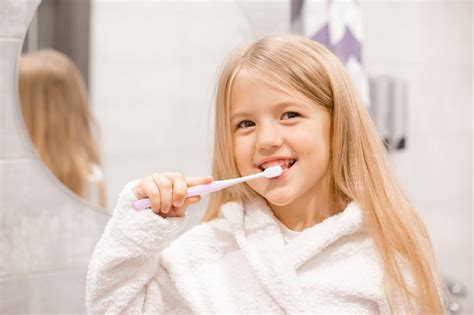 Child Brushing Teeth