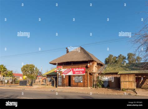 BRANDFORT, SOUTH AFRICA, AUGUST 2, 2018: A street scene, with coffee ...