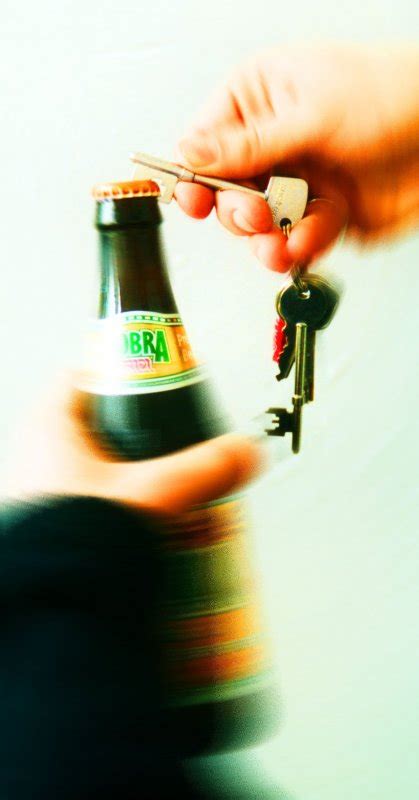 Key Bottle Opener : Looks like a regular key - Opens bottles.