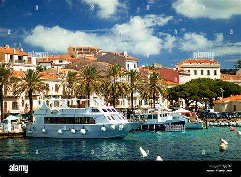 A photo of boats in Italy and beach houses Stock Photo - Alamy