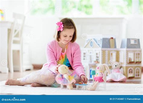 Little Girl Playing with Doll House. Kid with Toys Stock Image - Image ...