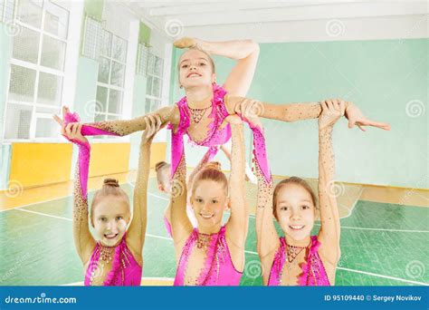 Happy Girls Doing Routine in Rhythmic Gymnastics Stock Photo - Image of ...