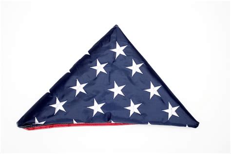 Premium Photo | Folded flag of the united states on white background ...