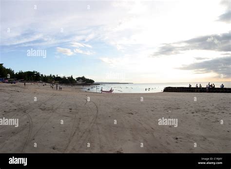 Sunset Tuban Beach in Kuta, Bali Stock Photo - Alamy