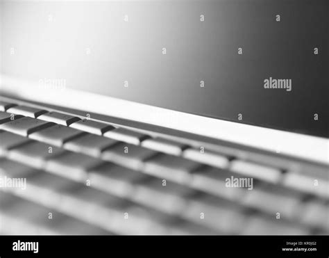 Diagonal cyan laptop keyboard bokeh background Stock Photo - Alamy