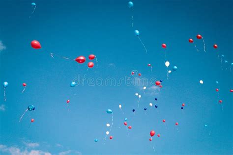 Balloons in the blue sky stock photo. Image of holiday - 151314190