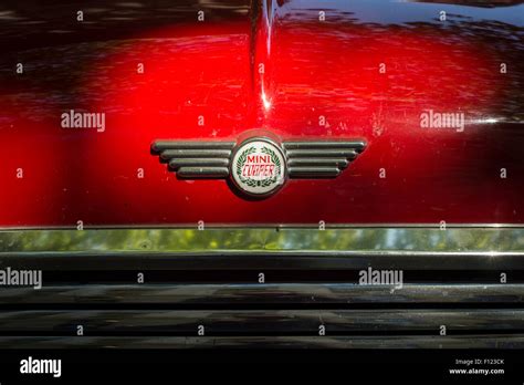 Mini Cooper badge on the front of an original 1960's vintage mini car Stock Photo - Alamy