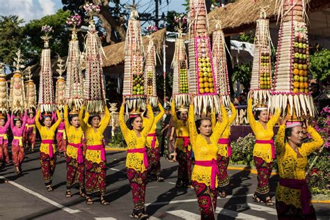 Performers prep for the street parade during the opening of the 38th ...