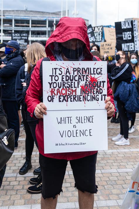 Group of People Holding Protest Signs · Free Stock Photo