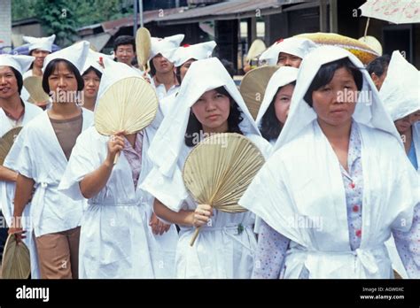 Malaysia women at a funeral of a much venerated Chinese lady. The Stock ...