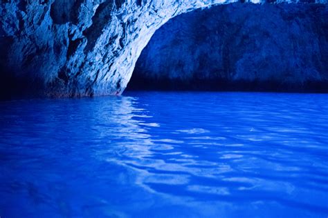 Inside the unique Blue Grotto cave at Capri Italy - Pure Vacations