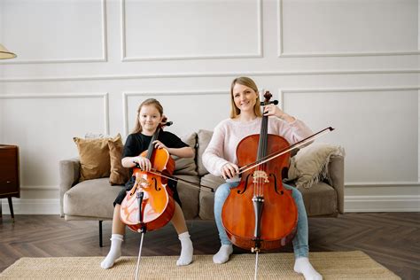 2 Women Playing Musical Instruments · Free Stock Photo