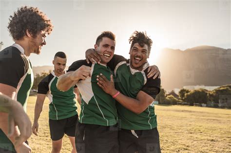 Rugby players celebrating a win stock photo (153309) - YouWorkForThem