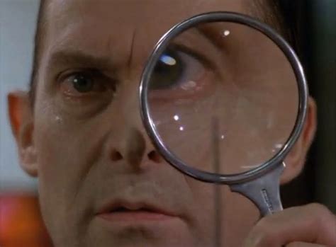 Sherlock looking through his magnifying glass | Jeremy brett, Sherlock holmes, Sherlock