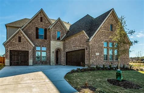 Two-story brick home | Texas style homes, Custom homes, Outdoor living ...