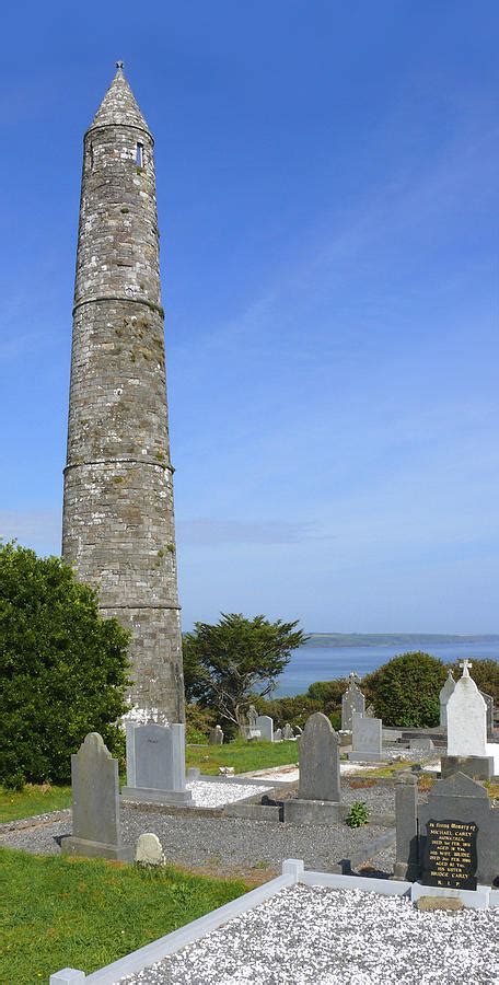 Ardmore Round Tower - Ireland Photograph by Mike McGlothlen