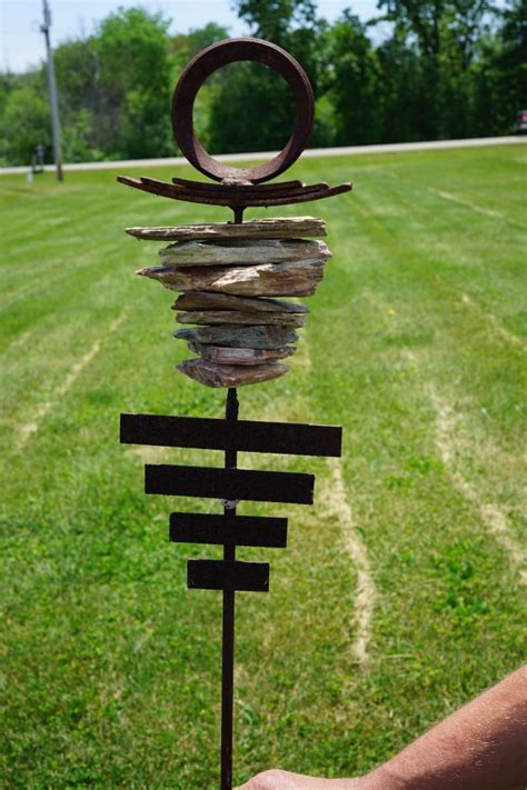 YARD ART OF SCULPTURE DESIGN USING SLABS OF STONE AND METAL ...