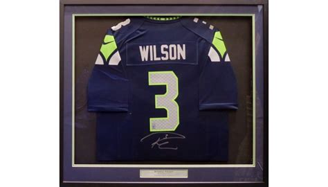 Russell Wilson Signed Framed Jersey - CharityStars