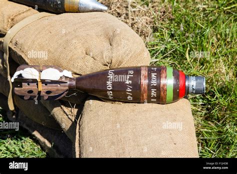 British Second world war 3 inch smoke mortar bomb, mark 2, laying. Red ...