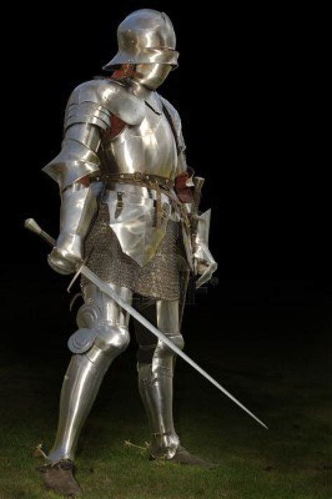 Medieval knight in shining armour of the 15th century standing.. | Century armor, Knight armor ...