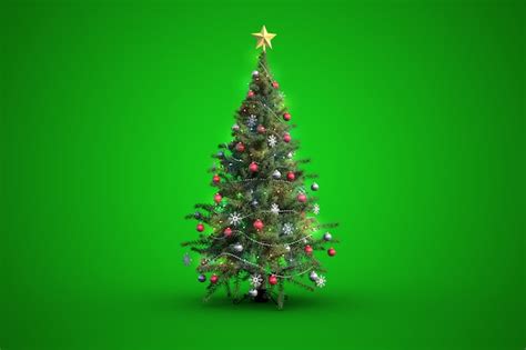 Premium Photo | Christmas tree on green background