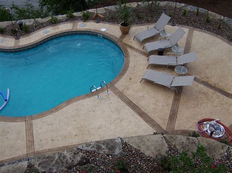 Stamped Concrete Pool Surrounds with Scenic Lake View