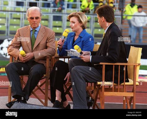 Franz Beckenbauer being interviewed by a television crew Stock Photo - Alamy