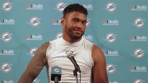 Miami Dolphins quarterback Tua Tagovailoa reacts to his first preseason ...