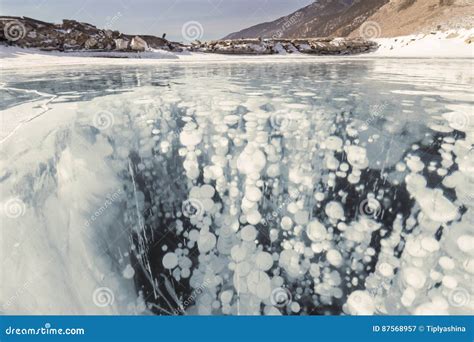 The Baikal Ice. Bubbles Of Methane Frozen In The Transparent Ice. In ...