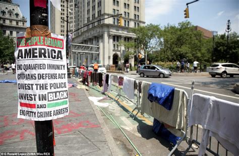 Protesters at NYC's City Hall graffiti buildings, block subways and ...