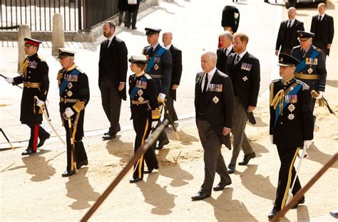 Queen s coffin is lowered into vault as she s reunited with prince ...