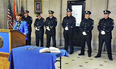 Albany police department promotes seven officers