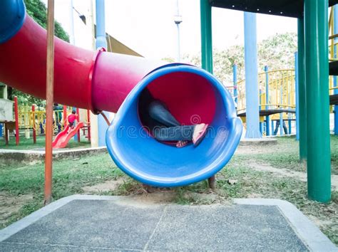 Playground Tunnel Slide stock photo. Image of shadow, playground - 3282940