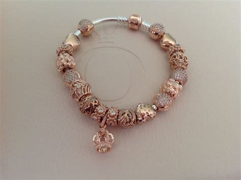 Pandora test product, rose gold dipped silver. Twelve charms and a two toned bracele… | Pandora ...