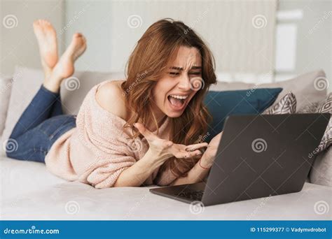 Portrait of an Angry Young Woman Using Laptop Computer Stock Image - Image of attractive, homey ...