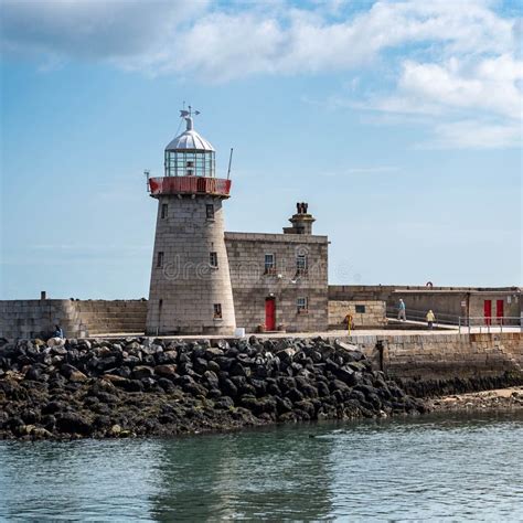 Lighthouse in Howth Harbor stock image. Image of dramatic - 121791695