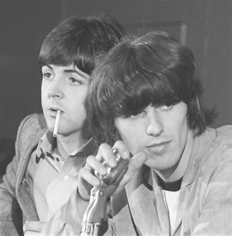 Paul McCartney and George Harrison during a press conference, 1965. Photo: AP | The beatles ...