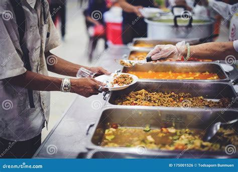 Volunteers are Giving Away Free Food To People Who Need Food, the Idea of Donating Stock Photo ...