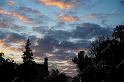 Premium Photo | Beautiful sunset over the building silhouette