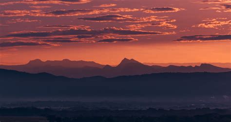 Silhouette of Mountains During Sunrise · Free Stock Photo