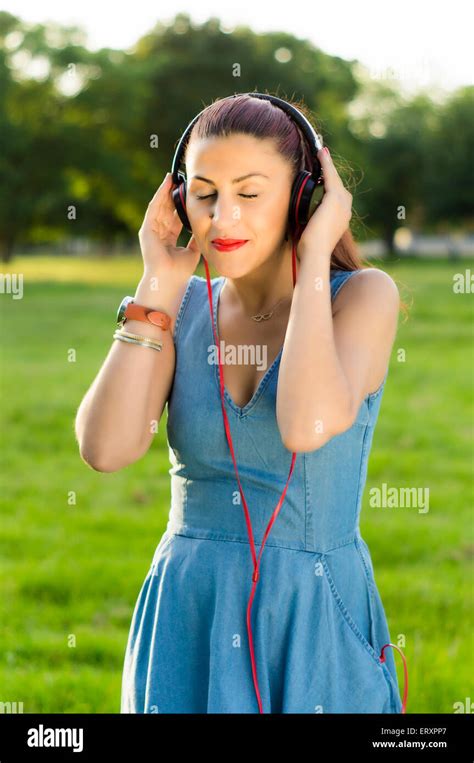 Tree eyes closed woman hi-res stock photography and images - Alamy