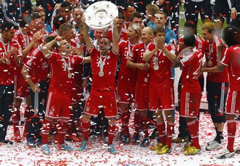 PIX: Bayern lift Bundesliga trophy after win over Augsburg - Rediff Sports